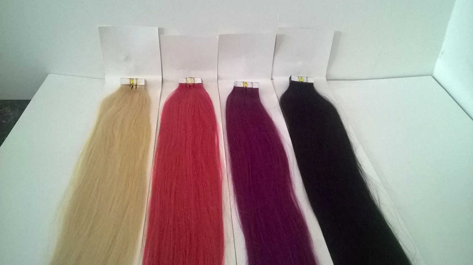 Tape In ( 20 Pieces = 50 Grams,     Each Piece =  2.5 Grams )   100 % Remy  Hair Extensions   22" inches  Grade 4A (Various colours available)   ON SALE